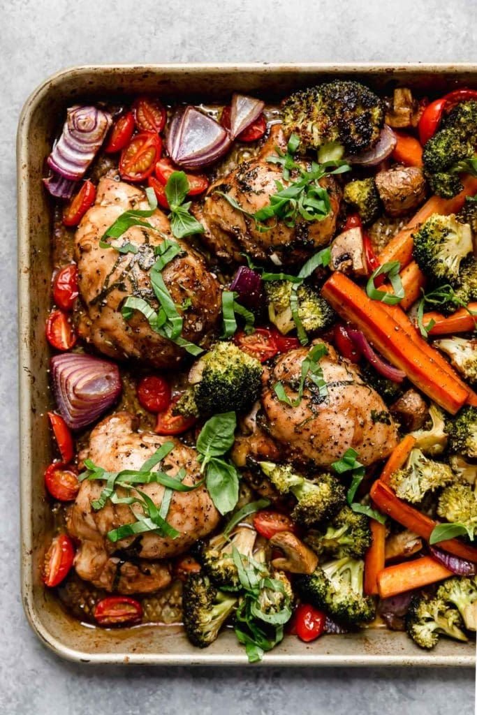 Sheet Pan Balsamic Chicken and Veggies There are some dinners I make when I want something comforting and homemade, but I really don't want a sink full of dishes afterward. This Sheet Pan Balsamic Chicken and Veggies is exactly that kind of recipe. Everything goes onto one pan—the chicken, colorful vegetables, and a simple balsamic marinade—and the oven does almost all of the work. The balsamic vinegar gives the chicken a tangy, slightly sweet flavor, while garlic, fresh herbs, and olive oil bring everything together. I love recipes like this on busy weeknights, especially when everyone is hungry and I don't have the energy to stand over the stove. I can chop everything, toss it with the marinade, slide the pan into the oven, and have dinner practically take care of itself. And somehow, roasted vegetables always taste a little more special. The broccoli gets those delicious browned edges, the carrots become tender and sweet, the mushrooms soak up all that savory flavor, and the tomatoes become warm and juicy. It's colorful, wholesome, satisfying, and incredibly easy. ⭐ Why You'll Love This Sheet Pan Dinner One pan means easy cleanup Ready in about 45 minutes Less than 20 minutes of hands-on prep Tender, flavorful chicken Lots of colorful roasted vegetables Tangy balsamic-garlic flavor Perfect for meal prep Easy to customize with whatever vegetables you have The original recipe is designed around a simple balsamic marinade and a combination of broccoli, carrots, mushrooms, red onion, and tomatoes. 🛒 Ingredients For the Balsamic Marinade 3 tablespoons balsamic vinegar 1/2 cup olive oil 4 cloves garlic, minced 1 teaspoon Dijon mustard 3 tablespoons fresh basil, finely chopped 1/2 teaspoon sea salt 1/4 teaspoon black pepper For the Chicken and Vegetables 1 1/4 pounds boneless, skinless chicken breasts, tenders, or thighs 4–5 cups broccoli florets 3–4 medium carrots, peeled and cut into sticks 2 cups button mushrooms, halved 1 small red onion, cut into chunks 1 cup cherry or grape tomatoes Extra fresh basil, for serving You can also switch up the vegetables. Zucchini, cauliflower, Brussels sprouts, parsnips, or other sturdy vegetables can work beautifully. 👩‍🍳 How to Make Sheet Pan Balsamic Chicken and Veggies 1. Make the Marinade In a bowl, whisk together the balsamic vinegar, olive oil, minced garlic, Dijon mustard, fresh basil, salt, and black pepper. The smell alone will make you hungry. You want everything well combined so the garlic and herbs are distributed throughout the marinade. 2. Marinate the Chicken Place the chicken in a large zip-top bag or shallow container. Pour about half of the balsamic mixture over the chicken. Toss well so every piece is coated. Cover and refrigerate while you prepare the vegetables. If you're planning ahead, the chicken can be marinated for several hours, and the original recipe allows marinating for up to 24 hours. 3. Prepare the Vegetables Preheat your oven to 400°F (200°C). Line a large rimmed sheet pan with parchment paper. Cut the broccoli into bite-sized florets. Peel and cut the carrots into sticks. Slice the mushrooms and cut the red onion into fairly large chunks. Keep the vegetables reasonably similar in size so they roast evenly. A little carrot tip: If you want very tender carrots, cut them into thinner sticks. If you prefer them to retain a little bite, make the sticks slightly thicker. 🥦 4. Season the Vegetables Place the broccoli, carrots, mushrooms, and red onion onto the prepared sheet pan. Pour the remaining balsamic marinade over the vegetables. Toss everything together until the vegetables are nicely coated. I like to take a minute to make sure the marinade gets into all the little broccoli florets because that's where so much flavor ends up. 🍗 5. Add the Chicken Move the vegetables around to create spaces for the chicken. Place the marinated chicken pieces among the vegetables. Discard any marinade that has been in contact with the raw chicken. Try not to overcrowd the pan. Giving the vegetables a little room helps them roast instead of simply steaming. 🔥 6. Start Roasting Place the sheet pan in the preheated oven. Roast for 10 minutes. At this point, the chicken and sturdier vegetables have had a head start. 🍅 7. Add the Tomatoes After the first 10 minutes, add the cherry or grape tomatoes to the pan. Give the vegetables a gentle toss and return the pan to the oven. Adding the tomatoes later helps them become tender and juicy without turning overly soft. ⏰ 8. Finish Baking Continue roasting for another 5–10 minutes, depending on the thickness of your chicken. The chicken should be cooked through and reach an internal temperature of 165°F (74°C) in the thickest part. If your chicken pieces are larger, they may need a little additional time. 🌿 9. Finish and Serve Remove the sheet pan from the oven. Sprinkle everything with fresh basil. Give the vegetables a final toss through all those flavorful juices on the pan. Then serve. That's it. One pan. One oven. Dinner is ready. 💡 My Best Tips for Perfect Sheet Pan Chicken Don't cut everything the same size Different vegetables naturally cook at different speeds. Carrots are firmer and take longer, while tomatoes cook very quickly. That's why adding the tomatoes later works so well. Give the vegetables room If the pan is packed too tightly, the vegetables release moisture and can steam rather than roast. Use a large sheet pan or divide everything between two pans if necessary. Cut carrots appropriately Thin carrot sticks will become very tender. Thicker pieces will retain more texture. Use chicken of similar thickness If one chicken breast is much thicker than the others, it will take longer to cook. Cut very large breasts in half horizontally or use chicken tenders for more consistent cooking. Don't reuse raw-chicken marinade Once the marinade has touched raw chicken, don't use it as a finishing sauce unless it is thoroughly cooked. 🥕 Vegetable Substitutions This recipe is wonderfully flexible. You can swap or add vegetables depending on what's in your refrigerator. Instead of broccoli: Cauliflower Brussels sprouts Zucchini Instead of carrots: Parsnips Winter squash Beets Instead of button mushrooms: Cremini mushrooms Baby bella mushrooms Oyster mushrooms Instead of red onion: Yellow onion Sweet onion Shallots The original recipe specifically suggests several of these swaps. 🍋 Easy Flavor Variations Lemon Balsamic Chicken Add a little fresh lemon zest to the marinade and squeeze fresh lemon juice over the finished dish. Italian Herb Version Use a combination of basil, thyme, oregano, and parsley. Spicy Balsamic Chicken Add crushed red pepper flakes to the marinade. Honey Balsamic For a slightly sweeter flavor, add a small drizzle of honey to the marinade. Mediterranean-Style Add Kalamata olives and sprinkle the finished dish with crumbled feta. 🍚 What to Serve With It Honestly, this meal can stand on its own. But if you're feeding a hungry family, a few additions make it even more satisfying. Try serving it with: Brown rice White rice Quinoa Couscous Roasted potatoes Mashed potatoes Crusty bread A simple green salad For a lighter dinner, I usually just serve the chicken and vegetables as they are. 🥗 Make It a Meal Prep Recipe This is one of the reasons I love sheet pan dinners so much. You can make the entire recipe ahead of time, divide it into containers, and have easy lunches ready for several days. The original recipe also specifically recommends portioning the cooked chicken and vegetables into meal-prep containers for convenient reheating. For meal prep, let the food cool slightly before dividing it into airtight containers. Store in the refrigerator and reheat when needed. ⏰ Make-Ahead Tips You can get a head start in several ways. The day before Prepare the balsamic marinade and refrigerate it. You can also chop the vegetables and store them separately. Earlier the same day Marinate the chicken in the refrigerator and have the vegetables ready to go. When dinner time arrives, simply assemble the sheet pan and roast. The original recipe notes that the chopped vegetables and marinade can be prepared ahead, making this especially convenient for busy weeknights. 🧊 Storage and Reheating Store leftovers in airtight containers in the refrigerator for up to 3–4 days. Reheat gently in the microwave or, for better roasted texture, in a 375°F oven until warmed through. An air fryer also works nicely for reheating individual portions. If you're meal prepping, I recommend keeping the chicken and vegetables together rather than separating everything. The balsamic flavor actually settles in beautifully overnight. ❓ Frequently Asked Questions Can I use chicken thighs? Absolutely. Boneless, skinless chicken thighs are juicy and work especially well with the balsamic marinade. Can I use chicken tenders? Yes. Chicken tenders are a great option because they cook relatively quickly and are naturally portion-sized. Can I use frozen vegetables? Fresh vegetables generally roast better and develop more caramelization. If using frozen vegetables, thaw and drain them well first. Why are my vegetables soggy? The pan may be overcrowded, or the vegetables may have released too much moisture. Use a large sheet pan and leave some space between the pieces. Can I add potatoes? Yes, but cut them fairly small because potatoes take longer to cook than many of the vegetables in this recipe. You may also want to give them a head start in the oven. Can I use dried herbs? Yes. Fresh basil gives the brightest flavor, but dried Italian herbs can work when fresh herbs aren't available. Can I marinate the chicken overnight? Yes. The chicken can be marinated ahead of time in the refrigerator; the source recipe allows up to 24 hours. Is this recipe gluten-free? The listed ingredients are naturally gluten-free, but always check individual packaged ingredients such as mustard for your specific dietary requirements. How do I know when the chicken is done? The safest method is to use an instant-read thermometer. Chicken should reach 165°F (74°C) at the thickest part. 📝 Recipe at a Glance Prep Time: 20 minutes Cook Time: 25 minutes Total Time: 45 minutes Servings: 4 Course: Dinner Method: Sheet Pan / Oven Ingredients Marinade 3 tablespoons balsamic vinegar 1/2 cup olive oil 4 garlic cloves 1 teaspoon Dijon mustard 3 tablespoons fresh basil 1/2 teaspoon sea salt 1/4 teaspoon black pepper Main Ingredients 1 1/4 pounds boneless, skinless chicken 4–5 cups broccoli 3–4 carrots 2 cups mushrooms 1 small red onion 1 cup cherry or grape tomatoes Extra fresh basil Quick Directions Heat oven to 400°F and line a sheet pan. Whisk together balsamic vinegar, olive oil, garlic, mustard, basil, salt, and pepper. Coat chicken with half the marinade and refrigerate. Toss broccoli, carrots, mushrooms, and onion with the remaining marinade. Add chicken to the sheet pan. Roast for 10 minutes. Add tomatoes and toss the vegetables. Roast another 5–10 minutes, until chicken reaches 165°F. Garnish with fresh basil. Serve warm. ❤️ Final Thoughts This Sheet Pan Balsamic Chicken and Veggies is the kind of recipe I come back to when I want dinner to feel homemade without making the evening complicated. There's something so satisfying about putting a beautiful assortment of vegetables and seasoned chicken onto one pan and letting the oven transform everything. The balsamic marinade gives the chicken a wonderful tangy flavor, while the roasted vegetables become slightly caramelized around the edges. Every bite feels fresh, savory, and comforting at the same time. And then there's the cleanup. One pan. That's it. For busy weeknights, meal prep, or those weekends when I want to spend more time relaxing and less time washing dishes, this recipe is a keeper. Tender chicken, colorful roasted vegetables, garlicky balsamic flavor, and almost no cleanup—this is exactly what an easy homemade dinner should be.