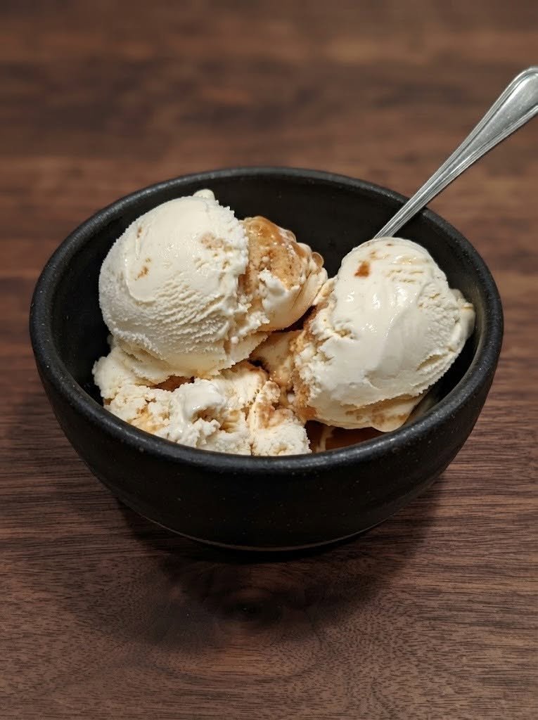 🍦 The Best Keto Ice Cream There are some keto desserts that are good enough to satisfy a craving. And then there are the ones that make you forget you're eating a keto dessert at all. This Keto Ice Cream is definitely in that second category. I’ve always thought ice cream should be creamy, rich, and easy to scoop—not something that turns into a rock-hard block five minutes after coming out of the freezer. That was exactly what I wanted when I started experimenting with homemade keto ice cream. I wanted something cold and silky on a warm afternoon. Something I could make without dragging out a complicated list of ingredients. Something that would feel like an actual scoop of ice cream rather than a frozen substitute. This recipe became my favorite. It's incredibly simple, but the texture is the real magic. Heavy cream gives it richness, powdered allulose helps keep it soft, vanilla gives it that classic ice-cream flavor, and just a tiny amount of xanthan gum helps reduce iciness. The first time I made a batch, I wasn't planning anything fancy. It was just a weekend treat. But once it was frozen, I scooped some into a bowl, added a little sugar-free chocolate drizzle, and sat down with a cup of coffee. That was it. I was hooked. And now this is the recipe I come back to whenever the craving for a cold, creamy dessert hits. ❤️ Why You'll Love This Keto Ice Cream There are so many reasons this recipe has become a favorite. 🍦 Creamy and rich 🥄 Soft enough to scoop 🧊 No ice cream maker required 🥛 Made with simple ingredients 🍨 Naturally sugar-free when using keto-friendly ingredients 🌿 Easy to customize ⚡ Very little hands-on preparation ☕ Amazing with coffee 🍫 Perfect with keto toppings And perhaps my favorite part? You don't need a fancy machine. A hand mixer or electric mixer is enough to whip the heavy cream into a thick base before freezing. No-churn keto ice cream recipes using heavy cream, powdered allulose, and xanthan gum follow this same basic approach. 🛒 Ingredients You'll Need 2 Cups Heavy Whipping Cream Use full-fat heavy cream. This is the foundation of the ice cream, so don't substitute a light cream if you want the richest texture. Full-fat cream is consistently recommended for homemade keto ice cream recipes. Keep it cold until you're ready to whip it. ⅓ Cup Powdered Allulose Powdered allulose is my preferred sweetener for this recipe. Besides adding sweetness, allulose is particularly useful in frozen desserts because it tends to stay softer than some other sugar substitutes. Several keto ice cream recipes specifically favor allulose for a softer, more scoopable texture. 1 Teaspoon Vanilla Extract Use pure vanilla extract if possible. Vanilla makes this taste like classic vanilla ice cream rather than simply frozen sweet cream. ¼ Teaspoon Xanthan Gum You only need a tiny amount. Xanthan gum helps thicken the mixture and can reduce the formation of ice crystals. Don't be tempted to add a lot—the texture can become gummy if you overdo it. Pinch of Salt This is technically optional, but I highly recommend it. Just a tiny pinch balances the sweetness and makes the vanilla flavor pop. 👩‍🍳 How to Make the Best Keto Ice Cream Step 1: Chill Everything Start with very cold heavy cream. If your mixing bowl has been sitting at room temperature, you can even place it in the refrigerator for a few minutes before beginning. Cold cream whips more easily and gives you a better base. 🥛 Step 2: Combine the Sweetener and Xanthan Gum Place the powdered allulose and xanthan gum in a small bowl. Whisk them together thoroughly. This little step is important because xanthan gum can clump if you dump it directly into a wet mixture. Distributing it through the powdered sweetener helps it incorporate more evenly. 🍦 Step 3: Whip the Cream Pour the cold heavy cream into a large mixing bowl. Using a hand mixer or stand mixer, begin whipping on medium speed. Gradually sprinkle in the powdered allulose mixture. Continue beating until the cream reaches soft-to-medium peaks. You want it thick and fluffy. Don't keep whipping until it becomes grainy or starts turning toward butter. ✨ Step 4: Add Vanilla and Salt Add the vanilla extract and pinch of salt. Gently mix until incorporated. At this point, give it a quick taste. If you prefer a sweeter ice cream, you can add a little more powdered allulose. Remember that frozen desserts taste less sweet once they're completely frozen, so the mixture can taste slightly sweeter before freezing. ❄️ Step 5: Freeze Transfer the mixture to a freezer-safe loaf pan or shallow airtight container. Smooth the top. Cover tightly. Place it in the freezer for at least 4 hours, or preferably overnight. A shallow container will usually freeze more evenly than a very deep one. 🥄 Step 6: Let It Soften Before Scooping This is the step that makes a huge difference. Take the ice cream out of the freezer and let it sit at room temperature for approximately 5–10 minutes before scooping. That short rest makes it much easier to scoop and gives you a creamier texture. Similar keto ice cream recipes recommend allowing the frozen dessert to soften briefly before serving. Then grab your favorite ice cream scoop. And don't be shy. 🍨 How to Make It Even Creamier If you want the smoothest possible texture, here are a few tricks that really help. Use powdered allulose Powdered sweetener dissolves more easily and helps prevent a gritty texture. Don't skip the xanthan gum You only need a small amount, but it helps improve the frozen texture. Don't over-whip the cream Stop once you reach soft-to-medium peaks. Use a shallow container A shallow layer freezes more evenly. Don't leave the container uncovered Ice crystals can form on the surface if the ice cream isn't properly covered. Let it sit before scooping Those few minutes on the counter make a surprisingly big difference. 🍫 Delicious Keto Ice Cream Variations The vanilla base is wonderful on its own, but this recipe is basically an invitation to experiment. 🍫 Chocolate Keto Ice Cream Add 2–3 tablespoons unsweetened cocoa powder to the mixture before freezing. For even more chocolate flavor, fold in a few chopped sugar-free chocolate pieces. 🍓 Strawberry Keto Ice Cream Fold in a small amount of finely chopped fresh strawberries. Keep the quantity modest because fruit contributes carbohydrates. 🥜 Peanut Butter Ice Cream Warm 2–3 tablespoons natural peanut butter slightly and swirl it through the ice cream before freezing. Don't completely mix it in—you want ribbons of peanut butter throughout. 🍪 Cookies & Cream Fold in chopped keto-friendly chocolate cookies. This is especially good with a little extra vanilla. ☕ Coffee Ice Cream Add 1–2 teaspoons instant espresso powder. The coffee flavor pairs beautifully with the rich cream. 🍋 Lemon Cheesecake Add a little lemon zest and a few spoonfuls of softened cream cheese. You'll get a cheesecake-inspired frozen dessert with a bright lemon flavor. 🧂 Salted Caramel Swirl in a few tablespoons of sugar-free caramel sauce and finish with a tiny pinch of flaky sea salt. This might be my favorite variation when I'm craving something indulgent. 🍫 My Favorite Toppings Once you've got a scoop of this creamy vanilla ice cream, the topping possibilities are endless. Try: Sugar-free chocolate sauce Sugar-free caramel sauce Chopped pecans Toasted almonds Unsweetened coconut Sugar-free chocolate chips Peanut butter drizzle Fresh berries Cinnamon Flaky sea salt Chopped keto cookies Or keep it simple. Sometimes vanilla ice cream doesn't need anything at all. ☕ The Best Way to Serve It One of my favorite ways to enjoy this is with a hot cup of coffee. The contrast between the cold, creamy ice cream and the hot coffee is wonderful. You can also turn it into a simple keto affogato by pouring a shot of hot espresso over a scoop of vanilla ice cream. That combination of bitter coffee and sweet, creamy vanilla is seriously hard to beat. 🥄 Can I Use an Ice Cream Maker? Absolutely. If you have an ice cream maker, you can chill the mixture thoroughly and churn it according to your machine's instructions. An ice cream maker generally gives you an even smoother texture because it continuously churns the mixture while it freezes. But you don't need one for this recipe. The no-churn method is one of the reasons I love it. 💨 Can I Make This in a Ninja CREAMi? Yes. The same basic ingredients can be adapted for a Ninja CREAMi-style preparation. Recipes designed specifically for the CREAMi commonly freeze the base in the pint container for about 24 hours before processing it on the ice cream setting. For this version, pour the prepared mixture into a compatible pint container, freeze according to the manufacturer's instructions, then process using the appropriate ice cream setting. If the texture comes out crumbly, a re-spin can help make it creamy. 🧊 Why Does Homemade Keto Ice Cream Get Hard? This is one of the biggest complaints with homemade low-carb ice cream. Traditional sugar doesn't just make ice cream sweet—it also affects how it freezes. Sugar substitutes behave differently. That's one reason allulose is so useful in keto frozen desserts. It tends to produce a softer texture than some alternatives, while stabilizers such as xanthan gum can help limit iciness. Even with this recipe, homemade ice cream can become firmer after several days in the freezer. That's normal. Just let it sit at room temperature for several minutes before scooping. 🧊 Storage Keep the ice cream in a tightly sealed freezer-safe container. For the best texture, I recommend enjoying it within about 1–2 weeks. The longer homemade ice cream stays frozen, the more likely its texture is to change slightly. Pressing a piece of parchment directly against the surface before sealing can also help reduce exposed air and ice crystals. ❓ Frequently Asked Questions Is this ice cream really keto? It's designed as a keto-friendly, sugar-free ice cream using heavy cream and a keto-friendly sweetener such as allulose. However, the exact carbohydrate count depends on the brands and quantities you use. Can I use erythritol instead of allulose? You can, but the texture may be different. Erythritol can crystallize as it freezes, which may result in a colder or grittier texture. Some keto ice cream recipes specifically favor allulose for this reason. Can I use monk fruit sweetener? You can use a monk-fruit blend, but check the ingredient label carefully because many products are blended with erythritol or other sweeteners. For the smoothest texture, a powdered allulose-based sweetener is my preference. Can I leave out the xanthan gum? Technically yes, but I wouldn't. The ice cream may become icier and less creamy without it. Why does my ice cream taste icy? This can happen if there isn't enough fat, if the sweetener crystallizes, or if too much moisture is present. Using full-fat cream, powdered allulose, and a tiny amount of xanthan gum helps address those texture issues. Can I make this dairy-free? Yes, but you will need to change the base. Full-fat coconut cream can be used to create a dairy-free version, although the flavor will have a noticeable coconut character. Can I add fruit? Absolutely. Just remember that fruit contains natural sugars and carbohydrates, so use keto-friendly portions if you're carefully tracking carbs. How long should I leave it out before scooping? Usually 5–10 minutes is enough. If it's especially firm, give it a little longer. Can I double the recipe? Yes. Just make sure you have a sufficiently large freezer-safe container and enough freezer space. A shallow container is preferable to one that's extremely deep. 📋 The Best Keto Ice Cream at a Glance Prep Time: 10 minutes Freeze Time: At least 4 hours Total Time: About 4 hours 10 minutes Servings: About 6 Method: No-churn Difficulty: Easy Ingredients 2 cups heavy whipping cream ⅓ cup powdered allulose 1 teaspoon vanilla extract ¼ teaspoon xanthan gum Pinch of salt Instructions Whisk powdered allulose and xanthan gum together. Whip cold heavy cream until soft-to-medium peaks form. Gradually incorporate the sweetener mixture. Add vanilla and salt. Transfer to a freezer-safe container. Freeze for at least 4 hours. Let sit for 5–10 minutes before scooping. Add your favorite keto toppings and enjoy. Exact nutrition will depend on the brands of cream and sweetener used, so calculate the nutrition from your specific ingredients if you're closely tracking carbohydrates. ❤️ The Ice Cream I Keep in the Freezer There's something about having homemade ice cream in the freezer that just makes life feel a little better. I love knowing that when a sweet craving hits, I don't have to make an elaborate dessert. I can open the freezer, let this soften for a few minutes, scoop it into a bowl, and suddenly I have something creamy and cold waiting for me. Sometimes I'll add a little sugar-free chocolate sauce. Sometimes it's peanut butter. Sometimes it's just vanilla ice cream and a spoon. And honestly? Those simple bowls are often the best ones. This recipe has become one of my favorite keto desserts because it doesn't feel like I'm settling for a “diet” version of ice cream. It feels like ice cream. Creamy. Cold. Sweet. Rich. And completely satisfying. So make a batch, put it in the freezer, and don't be surprised if you find yourself checking on it long before it's actually ready. Because sometimes the best keto dessert is the one that tastes like the real thing. 🍦❤️