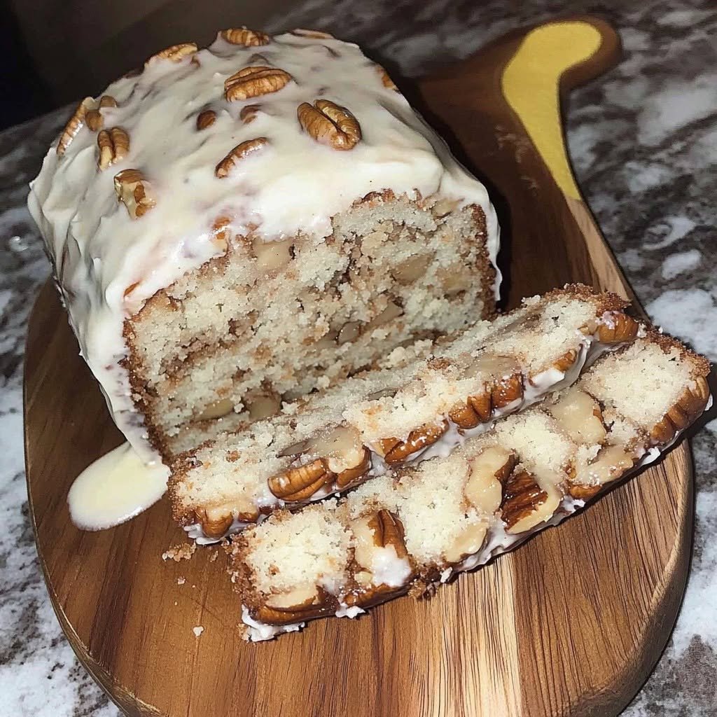🧈🥜 Keto Butter Pecan Cake There are some cakes that are pretty enough to put on a dessert table, and then there are cakes that make everyone wander into the kitchen asking, “What smells so good?” This Keto Butter Pecan Cake is definitely the second kind. The first time I made it, I was craving something buttery and comforting—something that tasted like the kind of old-fashioned cake you'd find at a family gathering, but without all the sugar and traditional flour. I had a bag of pecans sitting in the pantry, and once I started toasting them in butter, I knew I was onto something. That smell alone was incredible. Warm butter. Toasted pecans. Vanilla. It smelled like a holiday kitchen. I made the cake that weekend, and when I finally sliced into it, the crumb was soft and tender with little pieces of buttery pecan in every bite. Then I added a creamy frosting and, honestly, that was the moment this cake became a keeper. My family loved it. Even the people who weren't looking for a keto dessert went back for another slice. That's always my favorite kind of recipe—the one where nobody feels like they're eating a "special diet" version of anything. It's just really good cake. And if you love butter pecan ice cream, buttery pecan cookies, or those rich Southern-style desserts where toasted nuts are the star, you are going to love this one. ❤️ Why You'll Love This Keto Butter Pecan Cake This cake has everything I want in a cozy homemade dessert: Rich buttery flavor Toasted pecans throughout Soft, tender crumb Creamy frosting No traditional wheat flour No regular granulated sugar Perfect with coffee Wonderful for holidays and celebrations Easy to make ahead Freezer-friendly Keto butter pecan cakes commonly use almond flour and coconut flour to create a tender, sturdy crumb while replacing conventional sugar with a low-carb sweetener. Toasted pecans and a buttery frosting provide the signature flavor. 🛒 Ingredients For the Buttered Pecans 1½ cups chopped pecans 1 tablespoon unsalted butter 1 tablespoon powdered allulose or keto-friendly sweetener ¼ teaspoon salt For the Cake 2 cups finely ground almond flour ⅓ cup coconut flour 1 teaspoon baking powder ½ teaspoon salt ½ cup unsalted butter, softened ⅔ cup granulated allulose or keto-friendly sweetener 4 large eggs, room temperature 1 teaspoon vanilla extract ½ cup unsweetened almond milk ¾ cup prepared buttered pecans For the Creamy Butter Pecan Frosting 4 ounces cream cheese, softened ¼ cup unsalted butter, softened ½ cup powdered allulose or powdered keto sweetener 2 tablespoons heavy cream 1 teaspoon vanilla extract ¼ cup finely chopped buttered pecans Optional Garnish Extra toasted pecans A tiny pinch of flaky salt A drizzle of sugar-free caramel sauce 👩🍳 How to Make Keto Butter Pecan Cake 1. Toast the Pecans Start with the pecans because this little step makes a huge difference. Preheat your oven to 325°F (165°C). Place the chopped pecans on a baking sheet and toast for about 6–8 minutes, stirring once. Keep a close eye on them. Pecans can go from beautifully toasted to burned surprisingly quickly. You can also toast them in a dry skillet over medium-low heat for a few minutes. Once they're fragrant, remove them from the heat. 🧈 2. Make the Buttered Pecans Melt 1 tablespoon of butter in a skillet over low heat. Add the toasted pecans, powdered sweetener, and salt. Stir for about 1–2 minutes, just until the pecans are coated and glossy. Remove from the heat and allow them to cool. Set aside about ¼ cup of the pecans for the frosting. 🥣 3. Prepare the Cake Batter Preheat your oven to 325°F (165°C) if you haven't already. Grease a 9-inch round cake pan or an 8-inch square baking pan. For especially easy removal, line the bottom with parchment paper. In a medium bowl, whisk together: Almond flour Coconut flour Baking powder Salt Set aside. In a large mixing bowl, beat the softened butter and sweetener until light and fluffy. This should take about 2–3 minutes. Don't rush this part. Creaming the butter well helps give the cake a lighter texture. 🥚 4. Add the Eggs and Vanilla Add the eggs one at a time. Beat well after each addition. Then mix in the vanilla. The batter may look slightly separated at this point, especially if the ingredients were different temperatures. Don't worry. It will come together once the dry ingredients are added. 🥛 5. Add the Dry Ingredients Add about one-third of the dry mixture to the bowl. Mix gently. Add half of the almond milk. Mix again. Continue alternating the dry ingredients and almond milk until everything is incorporated. Don't overmix. You want the batter just combined. 🥜 6. Fold in the Pecans Add ¾ cup of the buttered pecans. Fold them gently into the batter with a spatula. Try to distribute the pecans evenly so every slice gets plenty. And don't be shy with them. The pecans are one of the best parts of this cake. 🎂 7. Bake the Cake Pour the batter into your prepared pan. Smooth the top with a spatula. Bake for approximately 30–38 minutes. Start checking around the 30-minute mark. The cake should be golden around the edges, set in the center, and a toothpick inserted into the middle should come out mostly clean. Don't wait for the toothpick to be completely dry. Overbaking almond-flour cakes can make them dry. ❄️ 8. Cool Completely Let the cake cool in the pan for about 10–15 minutes. Then carefully transfer it to a wire rack. Allow it to cool completely before frosting. I know. This is the hardest part. The kitchen smells amazing, the cake is sitting right there, and you're supposed to wait. But trust me. If you frost it while it's warm, the frosting will melt and slide right off. 🧁 9. Make the Butter Pecan Frosting While the cake cools, make the frosting. Beat the softened cream cheese and butter together until smooth. Add the powdered sweetener gradually. Then mix in the heavy cream and vanilla. Beat until creamy and fluffy. Fold in the finely chopped buttered pecans. Taste it. If you'd like it sweeter, add a little more powdered sweetener. If it's too thick, add another teaspoon of heavy cream. 🍰 10. Frost the Cake Once the cake is completely cool, spread the frosting evenly over the top. You can keep it simple with a thick layer across the top, or frost the sides too. I love leaving the sides mostly unfrosted because you can see those beautiful golden edges. Scatter extra toasted pecans over the top. For a special finishing touch, add a very light sprinkle of flaky salt. That little salty contrast makes the buttery sweetness even better. 🥜 The Secret to Amazing Butter Pecan Flavor If there's one thing I wouldn't skip in this recipe, it's toasting the pecans. Raw pecans are good. Toasted pecans are something else entirely. Toasting brings out their natural nuttiness and gives them a deeper, richer flavor. Then cooking them briefly in butter takes things even further. You get those little pockets of buttery, crunchy pecan throughout the soft cake. It's worth the extra few minutes. ⭐ My Best Tips for a Perfect Keto Cake Use room-temperature ingredients Room-temperature eggs and butter blend together much more easily. Don't overmix Once the flour goes in, mix only until combined. Measure almond flour carefully For consistent results, spoon it into your measuring cup and level it rather than packing it down. Toast the pecans This is the flavor-builder you don't want to skip. Don't overbake Almond flour cakes can dry out if left in the oven too long. Cool before frosting Completely. Seriously. Your frosting will thank you. Use powdered sweetener for the frosting It creates a much smoother frosting than granulated sweetener. 🍮 Want an Extra Moist Cake? If you prefer a softer, richer cake, add 2 tablespoons of sour cream or full-fat Greek yogurt to the batter. It adds moisture without dramatically changing the flavor. You can also add ¼ teaspoon xanthan gum if you prefer a slightly more structured crumb, although the cake works without it. 🍁 Optional Sugar-Free Caramel Finish Want to make this cake feel extra decadent? Drizzle a little sugar-free caramel sauce over the frosting. Then sprinkle the top with toasted pecans. Now you're getting dangerously close to butter pecan ice cream territory. And I'm not complaining. ☕ What to Serve With Keto Butter Pecan Cake This cake is wonderful with: Hot coffee Espresso Unsweetened tea Keto hot chocolate Whipped cream Sugar-free caramel sauce A scoop of keto vanilla ice cream A few extra toasted pecans My favorite combination is a slice of slightly chilled cake with a cup of hot coffee. The cold creamy frosting against the buttery cake is so good. 🎉 Perfect for Holidays and Celebrations This isn't just an everyday cake. It's beautiful enough for: Thanksgiving Christmas Birthday celebrations Family dinners Potlucks Sunday brunch Afternoon coffee Holiday dessert tables And because butter pecan is such a familiar flavor, you don't have to explain to everyone that it's keto. Just put it on the table. Let the cake speak for itself. 🔄 Easy Variations Chocolate Butter Pecan Cake Add ¼ cup unsweetened cocoa powder to the dry ingredients. You may need an extra tablespoon or two of almond milk. Maple Butter Pecan Add ½ teaspoon maple extract to the batter and another ¼ teaspoon to the frosting. Use a keto-friendly maple syrup if desired. Cinnamon Butter Pecan Add 1 teaspoon cinnamon to the cake batter. This is especially cozy in the fall. Pecan Coconut Cake Add ¼ cup unsweetened shredded coconut to the batter. Salted Caramel Pecan Cake Finish the frosted cake with sugar-free caramel and a pinch of flaky sea salt. Cupcakes Divide the batter between lined muffin cups. Bake until the centers are set, checking earlier than you would for a full cake. Cool completely before frosting. 🧊 How to Store Keto Butter Pecan Cake Because the frosting contains cream cheese, store the finished cake in the refrigerator. Cover it tightly and refrigerate for up to 5 days. For the best texture, let a slice sit at room temperature for about 10–15 minutes before eating. The flavors become even richer once the cake has had a little time to soften. ❄️ Can You Freeze Butter Pecan Cake? Yes. For the best results, freeze the cake before frosting it. Wrap the cooled cake tightly in plastic wrap, then place it in a freezer-safe container or bag. Freeze for up to 2–3 months for best quality. Thaw overnight in the refrigerator. Make the frosting fresh and decorate after the cake has completely thawed. You can also freeze individual frosted slices. Place them on a tray until firm, then wrap them individually. ❓ Frequently Asked Questions Is butter pecan cake keto? A traditional butter pecan cake is generally high in carbohydrates because it contains regular flour and sugar. This version replaces those ingredients with almond flour, coconut flour, and a keto-friendly sweetener, making it suitable for a low-carb or ketogenic approach when compatible ingredients are used. Can I use only almond flour? You can, but the texture will change. Coconut flour absorbs considerably more moisture, so removing it usually requires adjusting the liquid and eggs. For the most reliable result, I recommend using the combination listed here. Can I use erythritol instead of allulose? Yes. A granulated erythritol or monk-fruit blend can work in the cake. For the frosting, use a powdered variety for the smoothest texture. Keep in mind that different sweeteners vary in sweetness and can affect texture. Why did my keto cake turn out dry? The most common culprit is overbaking. Almond flour cakes can continue to firm up as they cool, so don't wait until the cake looks completely dry in the center. Can I use pecan halves? Absolutely. Just chop them before adding them to the cake. You can leave a few larger pieces for decorating the top. Can I make this cake nut-free? Not really, at least not as a butter pecan cake. Pecans and almond flour are central to the recipe. If you have a nut allergy, this isn't the cake I'd recommend adapting. Can I make this in a Bundt pan? Yes, but make sure the pan is well greased. A Bundt version may require a longer baking time, so begin checking the center toward the end of the expected baking range. Can I make it without frosting? Absolutely. The cake itself is buttery, nutty, and delicious. You can simply dust the cooled cake with powdered keto sweetener or serve each slice with whipped cream. How do I get stronger butter pecan flavor? Toast the pecans well, use real butter, and add a little vanilla. For an even more pronounced flavor, brown some of the butter before making the pecan mixture. 🍽️ Recipe at a Glance Prep Time: 20 minutes Cook Time: 30–38 minutes Cooling Time: 30 minutes Total Time: About 1 hour 20 minutes Servings: 10–12 slices Category: Dessert Cuisine: American-inspired Method: Baking ❤️ The Cake I Make When I Want Something Special I think there's something really comforting about butter pecan desserts. Maybe it's the smell of toasted pecans. Maybe it's the richness of real butter. Maybe it's because the flavor reminds me of family gatherings and those desserts that always seemed to disappear before you had a chance to go back for another piece. Whatever it is, this Keto Butter Pecan Cake brings all of that comfort to the table. I love making it on a quiet weekend when I have time to let the pecans toast slowly and the cake cool completely. There's something almost therapeutic about it. Toast the pecans. Cream the butter. Fold everything together. Wait for the cake to bake. Then spread that creamy frosting over the top. And finally, cut the first slice. The crumb is tender. The pecans are buttery and slightly crunchy. The frosting is creamy and sweet. And every bite tastes like a proper celebration cake. The funny thing is, nobody really cares that it's keto. They just know it's delicious. And that's exactly what I want from a low-carb dessert. Not something that feels like a compromise. Not something that makes you wish you were eating the "real" thing. Just a beautiful homemade cake that happens to fit the way you're eating. So brew yourself a cup of coffee, cut yourself a generous slice, and don't forget the extra pecans on top. Because sometimes the best kind of cake is the one that tastes like an old favorite—and still fits the table you're sitting at today. 🧈🥜❤️