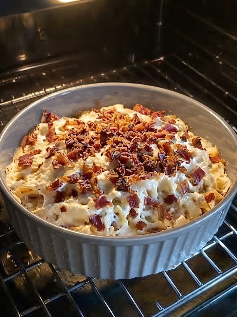 Keto Crack There are some recipes you make once and think, “That was pretty good.” And then there are recipes that disappear so quickly you start wondering if you should have made a double batch. This Keto Crack is definitely the second kind. It's salty, cheesy, creamy, savory, and completely addictive in the best possible way. The first time I tried a version of this recipe, I honestly wasn't expecting much. It looked simple enough, and the ingredient list wasn't particularly long. But after that first bite, I understood why recipes like this get such funny names. One bite turns into another. Then another. And suddenly you're standing in the kitchen wondering where half the bowl went. I love making this when I'm having friends or family over because it's the kind of snack everyone can gather around. It works for game nights, movie nights, parties, holidays, or those weekends when you just want something ridiculously delicious without spending hours cooking. And the best part? It's keto-friendly, low-carb, creamy, cheesy, and incredibly easy to customize. If you love bacon, ranch, cream cheese, and melted cheese together, you're going to want this one on repeat. ❤️ Why You'll Love Keto Crack There is a lot to love about this recipe. Rich and creamy Cheesy and savory Packed with bacon flavor Ranch seasoning adds tons of flavor Keto-friendly when made with suitable ingredients Low in carbohydrates Easy to prepare Perfect for parties and gatherings Delicious hot or chilled Easy to customize with your favorite keto-friendly toppings And honestly, it's one of those recipes where you don't need to overthink anything. Mix. Heat. Stir. Serve. That's pretty much it. 🛒 Ingredients For the Keto Crack 8 oz cream cheese, softened 1 cup shredded sharp cheddar cheese ½ cup shredded Monterey Jack cheese 6 slices bacon, cooked crispy and crumbled ½ cup sour cream 1 packet ranch seasoning mix 2 green onions, finely sliced ½ teaspoon garlic powder ¼ teaspoon black pepper Optional ¼ teaspoon red pepper flakes 2 tablespoons chopped jalapeños Extra shredded cheddar for topping Fresh parsley or chives for garnish Make sure your ranch seasoning and other packaged ingredients fit your particular low-carb goals, as carbohydrate counts can vary between brands. 👩🍳 How to Make Keto Crack 1. Cook the Bacon Start by cooking the bacon until it's beautifully crisp. You want it crisp enough to crumble easily. Transfer the cooked bacon to a paper towel-lined plate and let it cool slightly. Then crumble it into small pieces. And try not to eat all the bacon before it makes it into the recipe. That's harder than it sounds. 🧀 2. Soften the Cream Cheese Place the softened cream cheese in a large mixing bowl. If your cream cheese is still cold and firm, it will be much harder to mix smoothly. Let it sit at room temperature for about 20–30 minutes before starting. 🥣 3. Add the Ingredients Add the: Sour cream Ranch seasoning Garlic powder Black pepper Shredded cheddar Monterey Jack Crumbled bacon Green onions Mix everything together until well combined. The mixture should be thick, creamy, cheesy, and loaded with bacon. At this point, you'll probably be tempted to grab a cracker. Don't. We're keeping this keto. Grab a cucumber slice instead. 🔥 4. Warm the Mixture Transfer the mixture to a small saucepan or oven-safe baking dish. Stovetop Method Heat over low heat, stirring frequently, until the cheeses melt and everything becomes smooth and creamy. This usually takes around 5–8 minutes. Don't turn the heat too high. Cream cheese and shredded cheese can become greasy or separate if they're overheated. Oven Method Transfer the mixture to a baking dish. Bake at 350°F (175°C) for approximately 15–20 minutes, until hot and bubbly. 🧀 5. Add a Cheesy Finish If you're baking the dip, sprinkle a little extra shredded cheddar over the top during the final few minutes. Return it to the oven until the cheese melts and begins to bubble. That golden cheesy top is hard to resist. 🌿 6. Garnish and Serve Remove from the heat and let it cool for a few minutes. Top with sliced green onions, chopped parsley, crispy bacon, or fresh chives. Then serve warm. And prepare yourself. Because people tend to hover around this bowl. 🥒 What to Serve With Keto Crack Traditional crackers aren't necessary. There are so many keto-friendly options. Fresh Vegetables Try: Cucumber slices Celery sticks Bell pepper strips Radishes Broccoli florets Cauliflower florets Keto Chips Use your favorite low-carb tortilla chips or cheese crisps. Pork Rinds Crunchy pork rinds are one of my favorite pairings with creamy keto dips. Cheese Crisps The combination of crispy cheese and creamy cheese is seriously good. Lettuce Cups Spoon a little Keto Crack into crisp lettuce leaves for a fun low-carb bite. 🥓 Easy Variations Once you've made the basic version, there are so many ways to change it. Jalapeño Popper Keto Crack Add finely diced jalapeños and extra cheddar. For even more jalapeño flavor, add a few pickled jalapeños on top. Buffalo Keto Crack Add a few tablespoons of your favorite buffalo sauce and use shredded chicken instead of some of the bacon. Chicken Bacon Ranch Crack Add 1 cup cooked shredded chicken. This turns the dip into something substantial enough to serve as part of dinner. Spicy Bacon Crack Add cayenne pepper, red pepper flakes, or chopped hot peppers. Everything Bagel Crack Replace some of the ranch seasoning with everything bagel seasoning. Garlic Parmesan Crack Use Parmesan in place of some of the cheddar and add extra garlic. 🍗 Make It a Meal Keto Crack doesn't have to stay an appetizer. Use it as a creamy topping or sauce for: Grilled chicken Steak Pork chops Burgers Roasted vegetables Cauliflower Zucchini Broccoli You can even spoon it over cooked chicken and vegetables and bake everything together. The result is basically comfort food in casserole form. ⭐ Tips for the Best Keto Crack Use room-temperature cream cheese This helps everything blend together smoothly. Shred your own cheese Freshly shredded cheese generally melts more smoothly than many pre-shredded varieties. Cook the bacon until crisp Soft bacon can disappear into the creamy mixture. Crispy bacon gives you those delicious little salty bites. Keep the heat low High heat can cause dairy-based dips to become oily. Low and slow is the way to go. Don't add too much salt Bacon, ranch seasoning, and cheese are already salty. Taste before adding additional salt. Let it cool slightly The dip thickens as it cools, so give it a few minutes before deciding whether it needs anything else. 🧊 How to Store Keto Crack Allow leftovers to cool before transferring them to an airtight container. Refrigerate for 3–4 days. When you're ready to eat it again, gently reheat it on the stovetop or in the microwave. Add a small splash of heavy cream or milk if the mixture has become too thick. 🔥 How to Reheat Keto Crack Microwave Heat in 20–30 second intervals, stirring between each interval. This helps prevent the edges from becoming overheated. Stovetop Place in a saucepan over low heat and stir until smooth and hot. If needed, add a small splash of heavy cream to loosen the consistency. ❄️ Can You Freeze Keto Crack? You can freeze it, but dairy-based dips can sometimes change texture after freezing and thawing. For the best texture, I recommend making it fresh or storing it in the refrigerator for a few days. If you do freeze it, thaw overnight in the refrigerator and reheat gently while stirring well. ❓ Frequently Asked Questions Why is it called Keto Crack? The name refers to how incredibly addictive the combination of creamy cheese, bacon, ranch seasoning, and savory flavors can be. It's a playful recipe name rather than an ingredient. Is Keto Crack actually keto? It can be, depending on the ingredients and portion size. Cream cheese, cheese, bacon, and sour cream are generally compatible with a low-carb approach, but packaged ranch seasoning and other ingredients can vary in carbohydrate content. Can I make Keto Crack without bacon? Yes. The bacon adds a wonderful smoky, salty flavor, but you can leave it out or replace it with cooked chicken. Can I use turkey bacon? Absolutely. Just remember that the flavor will be somewhat different. Can I make it ahead of time? Yes. Prepare the mixture, cover it, and refrigerate it until you're ready to heat and serve. Can I make it in a slow cooker? Yes. Combine the ingredients in a small slow cooker and heat on LOW, stirring occasionally until everything is melted and creamy. This is particularly convenient for parties. Can I make it spicy? Definitely. Add jalapeños, cayenne, hot sauce, or red pepper flakes. Why did my dip become oily? The most common reason is overheating. Keep the temperature low and avoid aggressively boiling the cheese mixture. Can I use different cheeses? Absolutely. Try mozzarella, Colby Jack, pepper Jack, Parmesan, or a combination of your favorites. What is the best keto dipper? Cucumber slices, celery, pork rinds, and cheese crisps are all excellent choices. 🍽️ Recipe at a Glance Recipe: Keto Crack Prep Time: 10 minutes Cook Time: 10–20 minutes Total Time: About 30 minutes Servings: 8 Category: Appetizer / Snack Method: Stovetop or Oven Ingredients 8 oz cream cheese 1 cup shredded cheddar ½ cup shredded Monterey Jack 6 slices crispy bacon ½ cup sour cream 1 packet ranch seasoning 2 green onions ½ teaspoon garlic powder ¼ teaspoon black pepper Instructions Cook bacon until crisp and crumble. Soften cream cheese. Combine cream cheese, sour cream, ranch seasoning, garlic powder, and pepper. Stir in cheddar, Monterey Jack, bacon, and green onions. Heat gently on the stovetop until melted and creamy, or bake at 350°F (175°C) for 15–20 minutes. Add extra cheese on top if desired. Garnish with green onions, parsley, or bacon. Serve warm with keto-friendly dippers. ❤️ The Dip That Somehow Disappears Some recipes are meant to be elegant. This isn't necessarily one of them. Keto Crack is meant to be passed around, scooped up, and enjoyed. It's the bowl that starts in the middle of the table and somehow keeps getting closer and closer to everyone. You serve it with vegetables. Someone grabs a cucumber. Then someone goes back for another spoonful. Then somebody discovers how good it is with pork rinds. And before you know it, you're scraping the bottom of the bowl. That's exactly why I love recipes like this. They're easy. They're comforting. They're full of familiar flavors. And they make people happy. Whether you're making it for a weekend movie night, a family gathering, game day, or simply because you're craving something cheesy and savory, this is one of those recipes you'll want to keep close. Creamy cheese. Crispy bacon. Ranch seasoning. Garlic. Put them together and you've got one seriously irresistible keto dip.