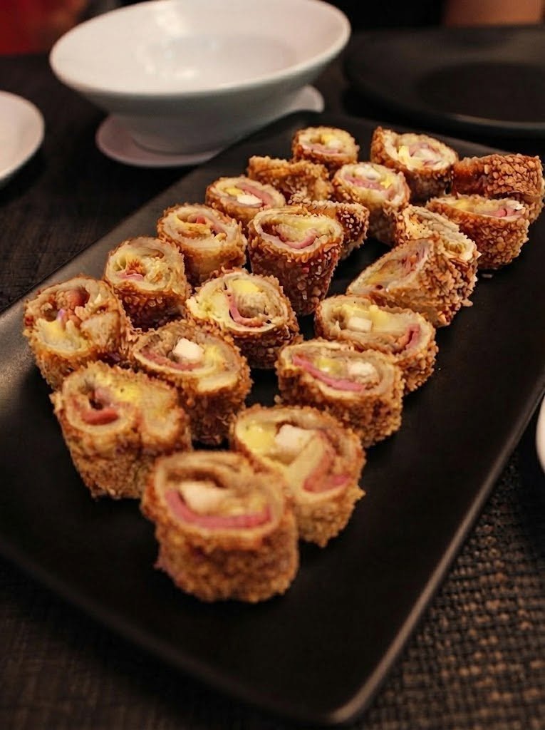 Keto Ham and Cheese Rolls There are some recipes that are complicated, impressive, and worth the effort. And then there are recipes like these Keto Ham and Cheese Rolls. They’re the kind of thing I make when I want something warm, cheesy, savory, and satisfying without spending half the evening in the kitchen. The combination of salty ham, melted cheese, and a soft, golden low-carb dough is just one of those combinations that is hard to resist. I first became interested in making ham and cheese rolls at home because I wanted something that felt like a little bakery-style treat but still worked for a keto-friendly way of eating. A family member suggested trying a low-carb version, and once I made them, I understood why the idea was so good. The first batch barely had time to cool. Everyone kept grabbing "just one more," and before I knew it, the plate was almost empty. That's usually how I know I've found a recipe worth making again. These rolls are wonderful for breakfast, lunch, an afternoon snack, or even as a simple appetizer. They're also great when you're craving something bread-like but don't want traditional flour. The dough is made with low-carb ingredients, then filled generously with ham and cheese before being rolled, sliced, and baked until golden. The result? Warm, cheesy, savory little rolls with plenty of comfort-food flavor. ❤️ Why You'll Love These Keto Ham and Cheese Rolls Low in carbohydrates compared with traditional ham and cheese rolls Soft, cheesy, and satisfying Packed with savory ham and melted cheese Easy enough for a weeknight Great for breakfast or lunch Delicious as an appetizer or snack Easy to customize with different cheeses Can be prepared ahead of time Perfect for lunchboxes and meal prep No complicated ingredients required And honestly, the best part is that they feel like a real treat. You don't feel like you're eating something "healthy" or missing out. You're just eating a delicious ham and cheese roll. 🛒 Ingredients For the Low-Carb Dough 1½ cups shredded mozzarella cheese 2 tablespoons cream cheese ¾ cup almond flour 1 teaspoon baking powder 1 egg white, lightly beaten ¼ teaspoon garlic powder ¼ teaspoon Italian seasoning ¼ teaspoon salt For the Filling 8 ounces thinly sliced deli ham ½ cup shredded cheddar cheese 4 mozzarella string cheese sticks, halved lengthwise or cut into pieces Optional Topping ¼ cup crushed pork rinds 1 tablespoon grated Parmesan ½ teaspoon Italian seasoning The crushed pork rind topping is completely optional, but it adds a lovely savory crunch and gives the rolls a beautifully golden exterior. 👩🍳 How to Make Keto Ham and Cheese Rolls 1. Preheat the Oven Preheat your oven to 350°F (175°C). Line a baking sheet with parchment paper or a silicone baking mat. Set it aside while you prepare the dough. 🧀 2. Melt the Cheese Add the shredded mozzarella and cream cheese to a microwave-safe bowl. Heat in 20–30 second intervals, stirring between each one, until the cheese is melted and smooth. Be careful not to overheat it. You want the cheese soft enough to mix but not bubbling or excessively oily. 🌾 3. Add the Dry Ingredients In a separate bowl, combine: Almond flour Baking powder Garlic powder Italian seasoning Salt Stir everything together. Add the dry mixture to the melted cheese. Begin mixing with a sturdy spoon or spatula. The dough will be sticky at first, and that's completely normal. 🥚 4. Add the Egg White Add the beaten egg white to the dough. Mix thoroughly until the egg white is completely incorporated. If the dough feels too wet or sticky to work with, add a small amount of almond flour—about 1 tablespoon at a time. Don't add too much at once. You want a soft dough that can be rolled without falling apart. 👐 5. Roll Out the Dough Place the dough between two sheets of parchment paper. Using a rolling pin, gently roll it into a rectangle approximately ¼ inch thick. Try to keep the edges reasonably straight. It doesn't have to look perfect. We're going to roll it up anyway. 🥩 6. Add the Ham and Cheese Lay the sliced ham evenly across the dough. Leave a small border around the edges so the filling doesn't squeeze out too much when you roll it. Sprinkle the shredded cheddar over the ham. Arrange the mozzarella pieces evenly across the surface. This is the part where you can be generous. A little extra cheese never seems to hurt. 🌯 7. Roll It Up Starting from one of the longer sides, carefully roll the dough into a tight log. Take your time here. If the dough sticks to the parchment, gently lift the parchment and continue rolling. Once completely rolled, place the seam underneath. This helps keep the roll together while baking. 🔪 8. Slice the Rolls Using a sharp knife, cut the log into approximately 10–12 rolls. Try not to make them too thin. Thicker slices will give you soft, cheesy centers and substantial rolls. Place them cut-side up on the prepared baking sheet. Leave a little space between each one. 🐷 9. Add the Optional Topping If you're using the topping, combine the crushed pork rinds, Parmesan, and Italian seasoning. Sprinkle a little over each roll. This adds extra flavor and a lovely crisp texture. 🔥 10. Bake Place the rolls in the preheated oven. Bake for approximately 15–20 minutes, or until the dough is golden and the cheese is melted and bubbling. Keep an eye on them during the final few minutes because almond-flour dough can brown quickly. For the best texture, let the rolls rest for about 5 minutes before serving. The cheese will be extremely hot when they first come out. 🧈 The Secret to Great Keto Ham and Cheese Rolls The biggest trick is handling the cheese dough while it's still warm and flexible. If the dough cools too much after melting the mozzarella and cream cheese, it can become difficult to roll. If that happens, don't panic. Warm it very gently for a few seconds and work it again. Also, don't overload the filling. It's tempting to pile on the ham and cheese, but too much filling can cause the rolls to separate while baking. A generous but even layer gives you the best result. ⭐ Tips for Perfect Rolls Don't overheat the cheese Melt it gradually and stir often. Work while the dough is warm Warm cheese dough is much easier to roll. Use parchment paper Rolling the dough between parchment sheets makes the process much easier and helps prevent sticking. Don't make the dough too thin A very thin dough can tear when rolled. Aim for roughly ¼ inch. Don't overfill Too much filling can make the rolls difficult to seal. Let them rest Give the rolls several minutes after baking so the cheese can settle. Use a sharp knife A sharp knife makes cleaner slices without crushing the roll. 🧀 Best Cheese Choices Mozzarella gives these rolls their stretchy, melty texture, but you can easily change things up. Cheddar Sharp cheddar gives the rolls a stronger, more pronounced flavor. Swiss Swiss cheese pairs beautifully with ham and gives the rolls a classic deli-style taste. Provolone Provolone creates a wonderfully creamy, mild filling. Pepper Jack For a little heat, use pepper Jack. Monterey Jack This is another excellent melting cheese with a mild flavor. You can even combine two or three cheeses. 🌶️ Easy Variations Once you have the basic recipe down, there are so many ways to change it. Jalapeño Ham & Cheese Rolls Add finely diced jalapeños to the filling. For extra heat, use pepper Jack cheese. Ham, Spinach & Cheese Rolls Add a thin layer of cooked spinach. Just make sure the spinach is squeezed very dry before adding it. Excess moisture can make the rolls soggy. Garlic Parmesan Rolls Add extra garlic powder to the dough and sprinkle Parmesan over the tops before baking. Ham & Swiss Rolls Replace the cheddar and mozzarella filling with Swiss cheese for a classic combination. Bacon Ham & Cheese Rolls Add crispy cooked bacon to the filling. Because apparently ham and cheese needed a little more bacon. And I'm not complaining. Turkey & Cheese Rolls Replace the ham with sliced turkey for a lighter-tasting variation. Everything Bagel Rolls Sprinkle everything bagel seasoning over the tops before baking. 🍳 What to Serve With Keto Ham and Cheese Rolls These rolls are versatile enough to fit almost any meal. For breakfast, serve them with: Scrambled eggs Fried eggs Bacon Sausage Avocado Fresh berries For lunch, try them with: Green salad Caesar salad Cucumber salad Tomato salad Roasted vegetables Keto soup For a party or appetizer platter, serve them alongside: Ranch dressing Garlic aioli Dijon mustard Spicy mayo Marinara sauce Jalapeño ranch A little Dijon mustard on the side is especially good with the salty ham and melted cheese. 🥣 Dipping Sauce Ideas A dipping sauce can completely change the flavor of these rolls. Creamy Garlic Sauce Mix mayonnaise with minced garlic, lemon juice, salt, and pepper. Spicy Mayo Combine mayonnaise with hot sauce and a pinch of smoked paprika. Ranch A simple ranch dip works beautifully. Dijon Cream Mix Dijon mustard with mayonnaise and a little sour cream. Sugar-Free Marinara For a pizza-inspired version, serve the rolls with a keto-friendly marinara sauce. 🥶 Can You Make These Ahead of Time? Absolutely. You can prepare the dough, fill it, roll it, and slice it several hours ahead. Arrange the rolls on a baking sheet, cover them, and refrigerate until you're ready to bake. When you're ready, simply place them in the oven. You may need to add a few extra minutes to the baking time because the rolls will be cold from the refrigerator. 🧊 How to Store Keto Ham and Cheese Rolls Allow leftover rolls to cool before storing them. Place them in an airtight container and refrigerate for 3–4 days. Because these contain ham and cheese, don't leave them sitting at room temperature for extended periods. The USDA recommends refrigerating perishable leftovers promptly and using most cooked leftovers within 3–4 days. 🔥 How to Reheat Them Oven Place the rolls on a baking sheet and heat at 350°F (175°C) for several minutes until warmed through. This gives you the best texture. Air Fryer Reheat at around 350°F (175°C) for a few minutes. The outside will become pleasantly crisp again. Microwave For the quickest option, microwave one or two rolls until hot. The texture will be softer, but they'll still taste delicious. For leftover food, the USDA recommends reheating to 165°F (74°C). ❄️ Can You Freeze Keto Ham and Cheese Rolls? Yes, although the texture is best when they're freshly baked or refrigerated. If you want to freeze them, allow the baked rolls to cool completely. Place them in a freezer-safe container with parchment between layers. Freeze for up to 2 months for best quality. Thaw overnight in the refrigerator and reheat in the oven or air fryer. For the crispiest result, avoid microwaving after freezing. ❓ Frequently Asked Questions Are these Keto Ham and Cheese Rolls really low carb? They're designed as a low-carb alternative to traditional ham and cheese rolls because the dough uses almond flour rather than wheat flour. The exact carbohydrate count depends on the brands of ham, cheese, almond flour, and other ingredients you use, so check your individual labels if you're tracking carbs closely. Can I use coconut flour instead of almond flour? Not as a direct one-to-one substitution. Coconut flour absorbs much more liquid than almond flour, so the recipe would need to be reformulated. Can I use regular flour? Yes, if you aren't following a keto or low-carb diet, but it will change the recipe and carbohydrate content considerably. Why is my dough sticky? The cheese may still be very warm, or the dough may need a little more almond flour. Add almond flour gradually rather than adding a large amount at once. Why did my rolls fall apart? The most common reasons are overfilling, rolling the dough too loosely, or slicing it before the dough has properly sealed. Keep the filling evenly distributed and roll the dough firmly. Can I use different deli meat? Absolutely. Turkey, chicken, roast beef, or salami can all work. Just choose thin slices so the roll remains easy to form. Can I make them without pork rinds? Yes. Simply leave them off. You can use Parmesan and Italian seasoning instead, or bake the rolls without any topping. Can I add vegetables? Yes, but keep moisture under control. Cooked spinach, mushrooms, peppers, and jalapeños are delicious additions. Make sure watery vegetables are cooked and drained well first. Can I make these in an air fryer? Yes. Arrange the rolls in a single layer and cook at approximately 350°F (175°C) until the dough is golden and the cheese is melted. Air fryers vary, so begin checking early. Can I eat them cold? Yes. Once properly chilled, they can be eaten cold, although they're especially satisfying when warm and gooey. Are these good for meal prep? Definitely. They're easy to portion into individual servings and can be refrigerated for several days. 📝 Recipe at a Glance Recipe: Keto Ham and Cheese Rolls Prep Time: 15 minutes Cook Time: 15–20 minutes Total Time: About 35 minutes Servings: 10–12 rolls Category: Breakfast / Snack / Appetizer / Lunch Cuisine: American-inspired Method: Oven-baked Ingredients Dough 1½ cups shredded mozzarella 2 tablespoons cream cheese ¾ cup almond flour 1 teaspoon baking powder 1 egg white ¼ teaspoon garlic powder ¼ teaspoon Italian seasoning ¼ teaspoon salt Filling 8 ounces deli ham ½ cup shredded cheddar 4 mozzarella string cheese sticks Optional Topping ¼ cup crushed pork rinds 1 tablespoon Parmesan ½ teaspoon Italian seasoning Instructions Preheat oven to 350°F (175°C). Line a baking sheet with parchment. Melt mozzarella and cream cheese together until smooth. Mix almond flour, baking powder, garlic powder, Italian seasoning, and salt. Combine the dry ingredients with the melted cheese. Mix in the beaten egg white. Roll the dough between parchment into a rectangle about ¼ inch thick. Layer ham, cheddar, and mozzarella over the dough. Roll tightly into a log. Place seam-side down and slice into 10–12 rolls. Arrange on the baking sheet. Add optional pork-rind and Parmesan topping. Bake for 15–20 minutes, until golden and melted. Rest for about 5 minutes before serving. ❤️ The Kind of Keto Recipe You Make Again and Again I love recipes that don't make eating low-carb feel complicated. These Keto Ham and Cheese Rolls are exactly that kind of recipe. They're warm and cheesy, packed with savory ham, and just satisfying enough to make you forget you're eating a low-carb alternative. I can imagine making a batch on a lazy Saturday morning, putting them on the table while everyone is still wandering into the kitchen, and watching them disappear one by one. They're also perfect for those evenings when you don't really feel like cooking. You can prepare them quickly, pop them into the oven, and before long the whole kitchen smells like melted cheese, buttery dough, and savory ham. And then comes the difficult part: Trying to wait long enough for them to cool. Serve them with eggs for breakfast, salad for lunch, or your favorite dipping sauce as an appetizer. However you serve them, one thing is almost guaranteed. You probably won't have leftovers for long.